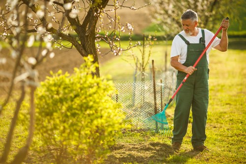 Training session with gardeners learning safe tool use